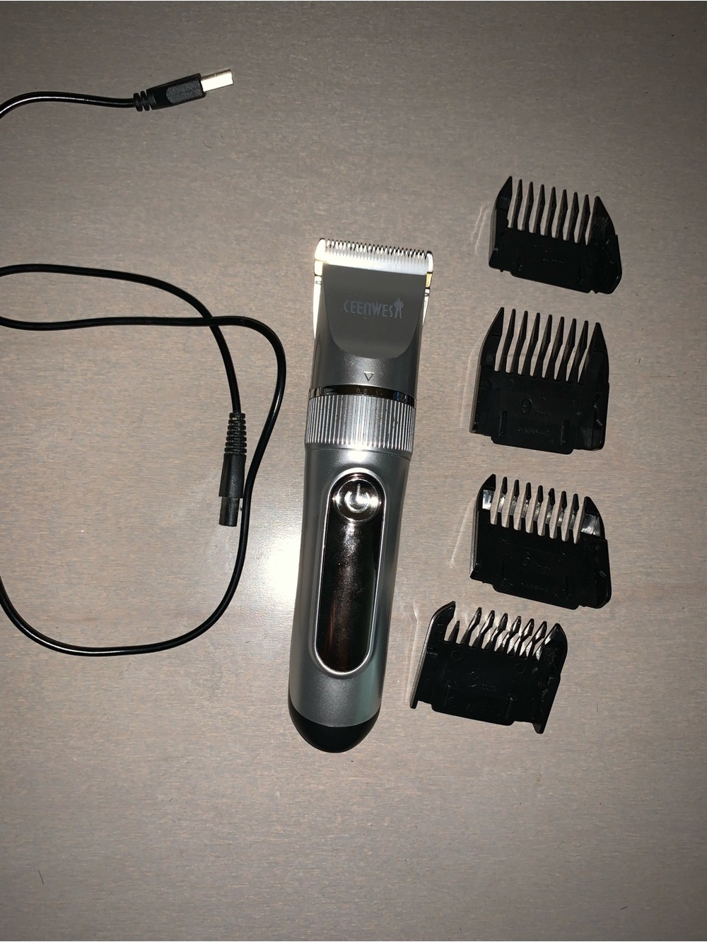Silver Rechargeable Men's Hair Trimmer with 4 Guide Combs